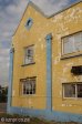 durban-point-mahatma-gandi-yellow-building-facade-s29-52-31-e31-02-27