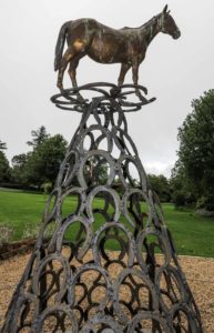 Horse Memorial with salvaged horse-shoes forming the base.